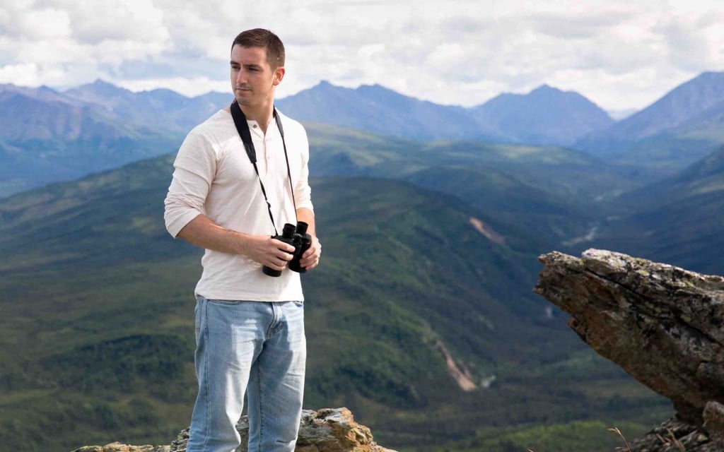 Taking in the view at Denali National Park, Alaska in ManAboutWorld gay travel magazine and Towleroad