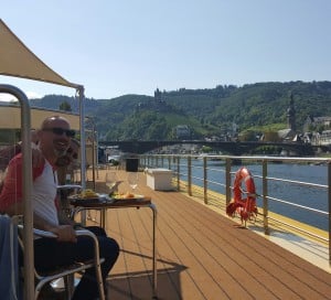 The author and his husband on a river cruise. Uniworld cruise on Towleroad and in ManAboutWorld gay travel magazine