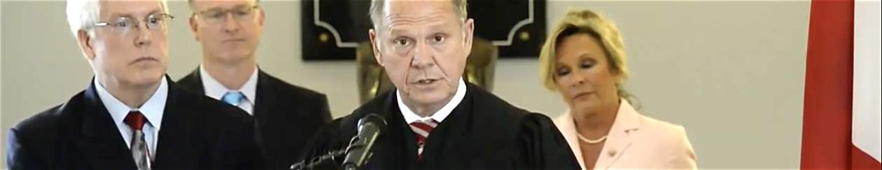 Roy Moore suspended