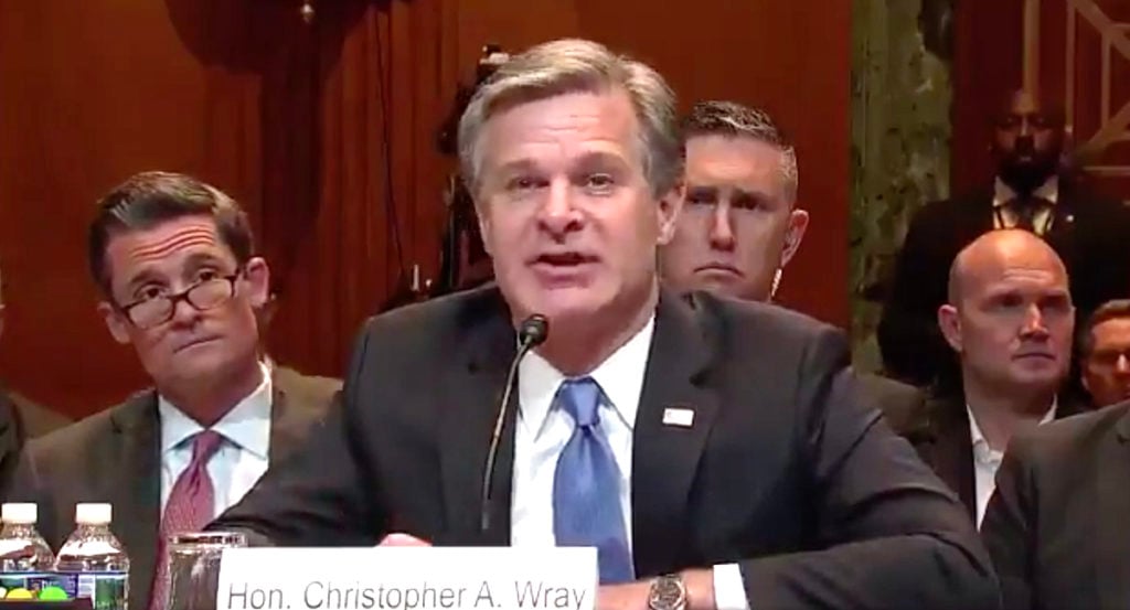 Christopher Wray spying