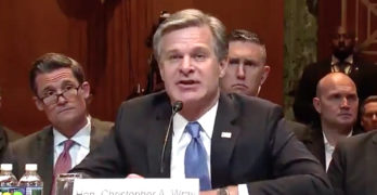 Christopher Wray spying