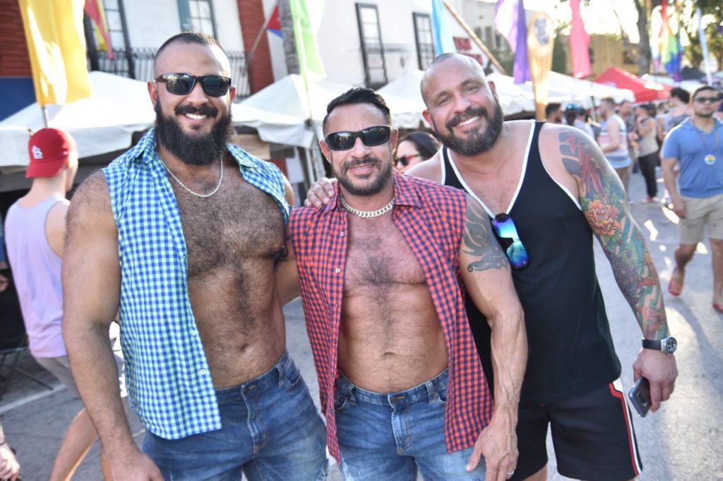 Three Gay8 attendees enjoy the Miami heat.