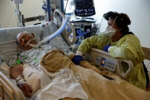 A year after first U.S. shots, pandemic hallmarks re-emerge 10 471023 origin 1