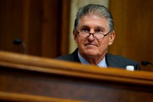 Biden pledge to tax wealthy, companies revived with Manchin-led bill 8 607002 origin 1