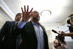 Alex Jones saw profit in Sandy Hook hoax claims, victims' lawyer says at trial 18 642521 origin 1