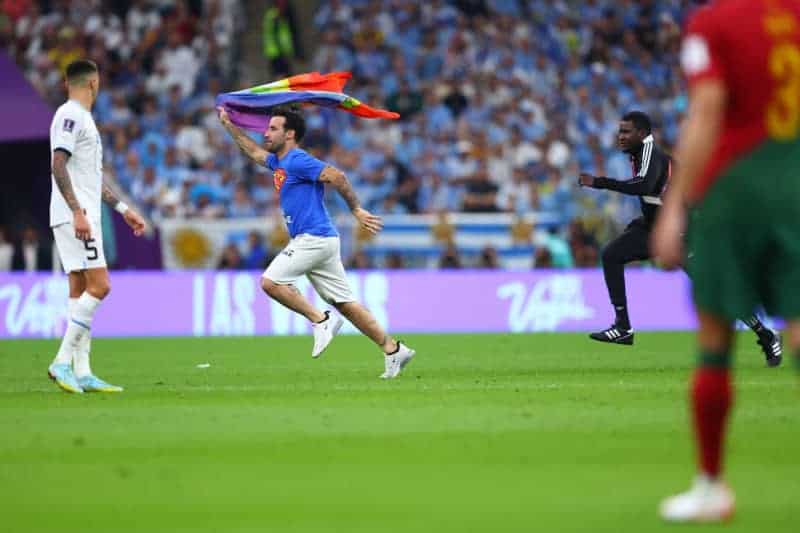Pitch invader with rainbow flag halts Portugal v Uruguay in Qatar 89 657163 657163 origin 1 2