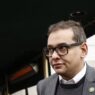Rep. George Santos admits to fraud, using stolen checks